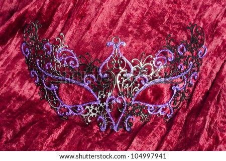 Fancy Venetian Carnival Face Mask on Red Velvet