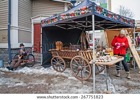 JYVASKYLA, FINLAND - MARCH 27, 2015: Toivola Old Courtyard, home to the Easter Market in Jyvaskyla, Finland, March 27, 2015