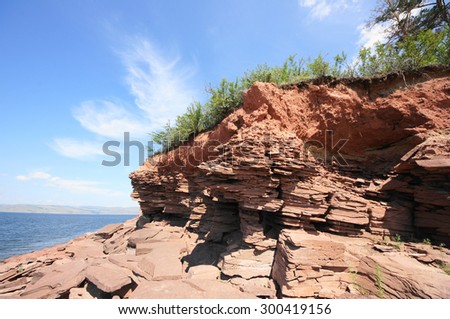 Slate stones on the river Yenisei rocky shore.