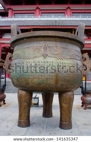 CHONGSHEN MONASTERY DALI YUNNAN PROVINCE CHINA - MAY 8: Buddhist Bronze cauldron  - May 08, 2013,Chongshen monastery, Dali Yunnan province, China.