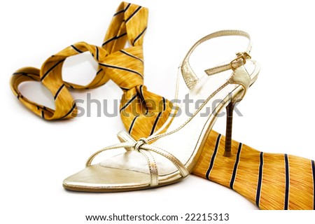 woman golden stiletto stepping necktie isolated on white