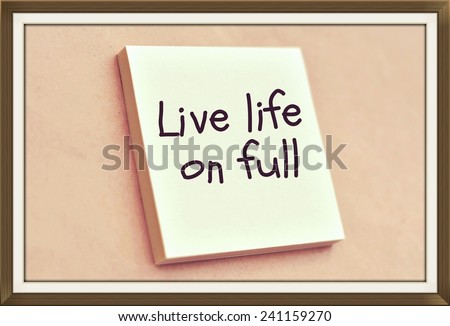 Text live life on full on the short note texture background