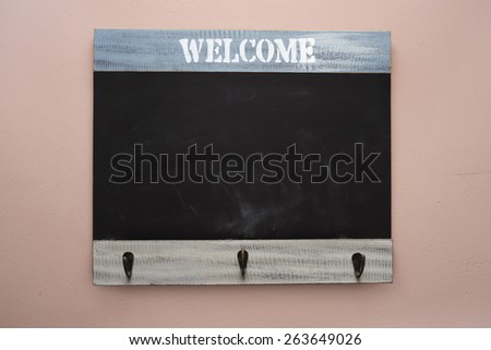 welcome chalk board on the wall