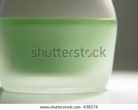 Green Cream/Lotion in Cosmetic Container