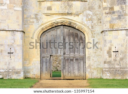 Titchfield Abbey Castle entrance with large wooden doors