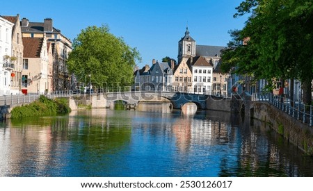 Similar – Image, Stock Photo Old bridge across channel in sunset