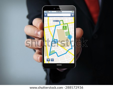 gps satellite navigation concept: businessman hand holding a 3d generated touch phone with navigation application on the screen. Screen graphics are made up.