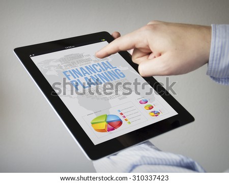 new technologies and plan concept: hands with touchscreen tablet with financial planning on the screen. Screen graphics are made up.