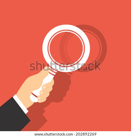 Vector Illustration Of  A Magnifying Glass in Hand 