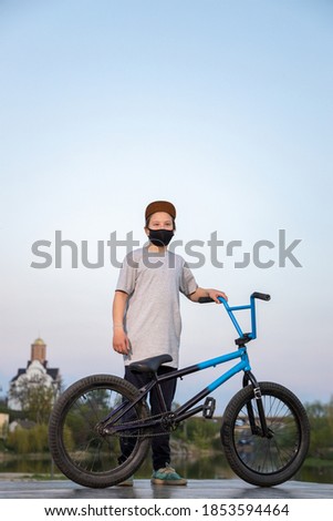 Similar – Image, Stock Photo 11 Cyclists ride one after the other on a dam