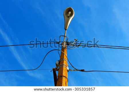 A street light.Outdated electric line. Photo stock © 