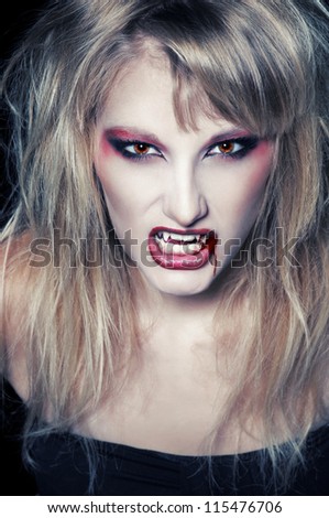 The Portrait Of A Blond Girl Vampire With Bloody Streaks Stock Photo ...