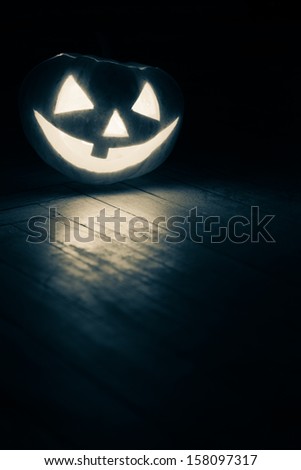 jack-o-Lantern in the dark on the floor