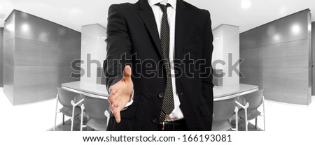 young businessman shake hand gesture in office or waiting room