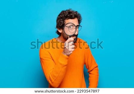 Similar – Image, Stock Photo Man with magnifying glass searches for the ideal employee