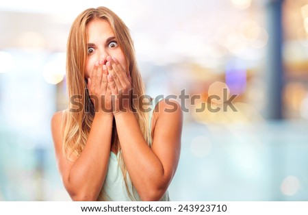 young cool woman covering her mouth