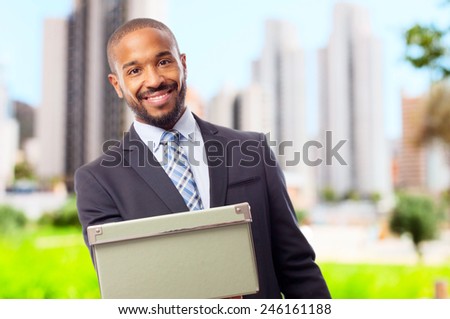 young cool black man offering a box