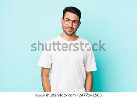 Similar – Image, Stock Photo A young man is standing alone in the landscape, but the sky is cloudy. Anyway.