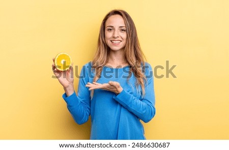 Similar – Image, Stock Photo Woman showing half orange over bowl