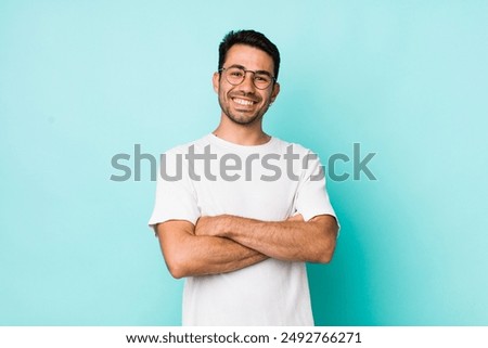 Similar – Image, Stock Photo A young man is standing alone in the landscape, but the sky is cloudy. Anyway.