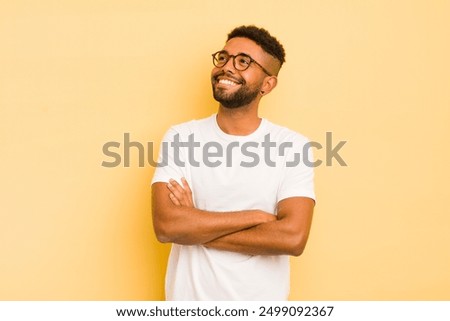 Similar – Image, Stock Photo a young man with curly hair and his skateboard with a red background on a sunny summer day