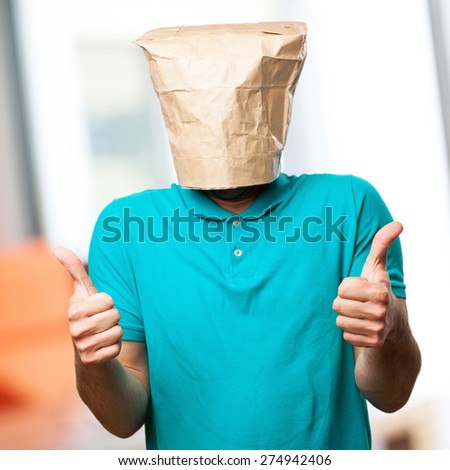 crazy man with paper bag in his head