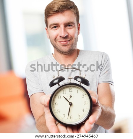 blond man with a clock