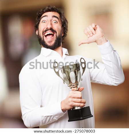 man with a champion cup