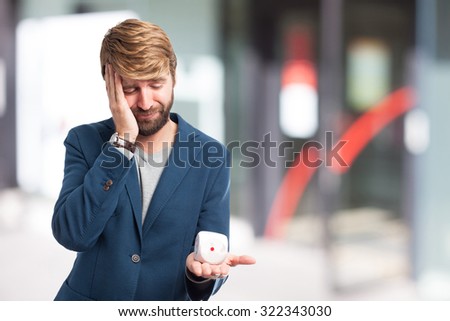 sad businessman with dice