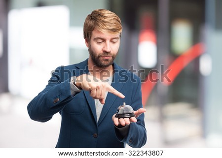happy businessman with ring bell