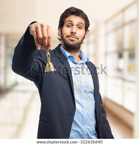 happy businessman with ring bell