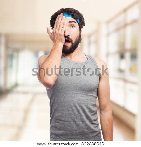 sad sport man covering eye