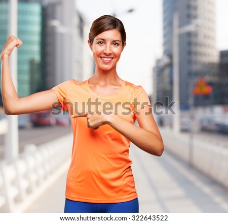 happy sport woman strong pose