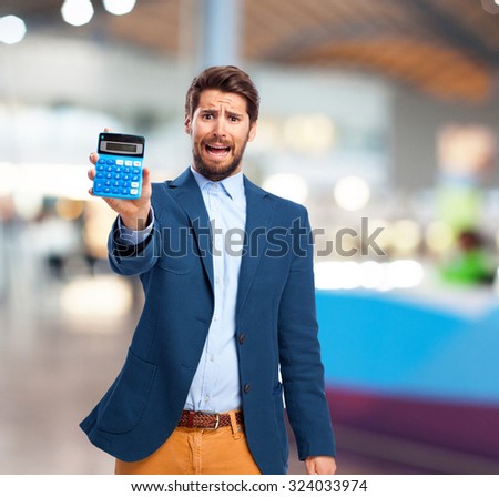 worried businessman with calculator