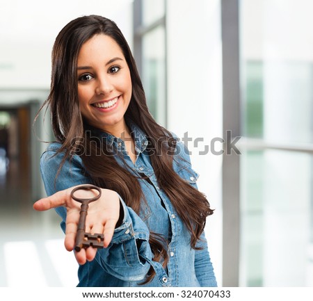 angry young woman with vintage key