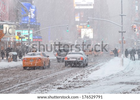 NEW YORK CITY - FEBRUARY 13, 2014: Snow blizzard weather in Manhattan Times Square