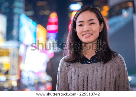 Young Woman in New York City, New York at Night. Stock Image