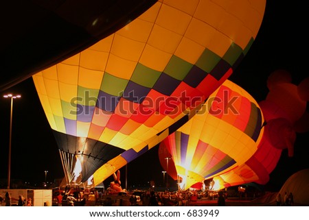 Desert Glow, Hot Air Baloons Turn Burners On At Night