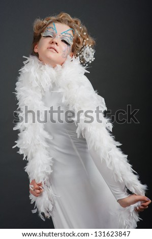 girl dressed in white fluffy hair