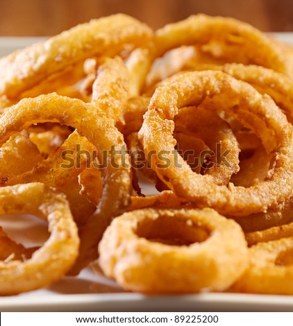 closeup photo of a pile of onion rings