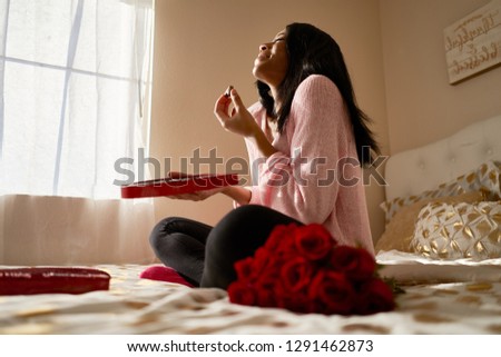 Similar – Image, Stock Photo Black woman eating candy