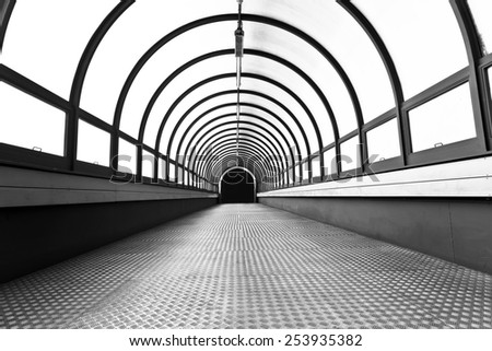Pedestrian tunnel over a wide highway.