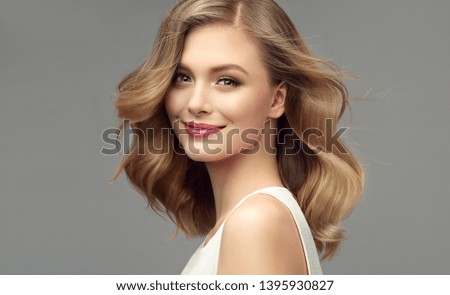 Similar – Image, Stock Photo Blond haired lady is posing in park dancing with her long blond hair fling in an air