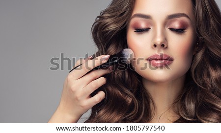 Similar – Image, Stock Photo Woman applying lipstick and looking in side mirror of bus