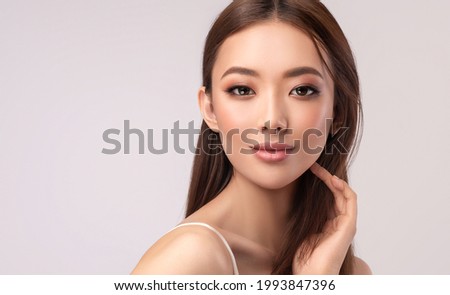 Beautiful Asian woman with  straight hair. Beauty Chinese  girl  clean and white skin. 商業照片 © 