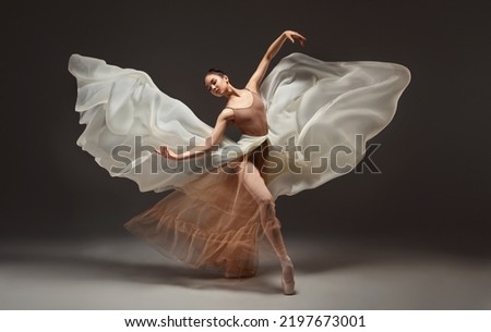 Similar – Image, Stock Photo Graceful woman dancing in dark park