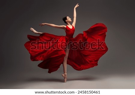 Similar – Image, Stock Photo Graceful acrobat performs with hoop on beach