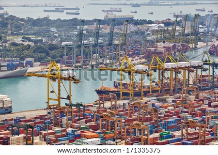 SINGAPORE - DECEMBER 07: The port of Singapore on December 07, 2013 in Singapore. It\'s the world\'s busiest transshipment port and the world\'s second-busiest port in terms of total shipping tonnage.
