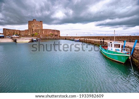 Medieval Anglo Norman Carrickfergus Castle and dock close to Belfast, Northern Ireland, UK