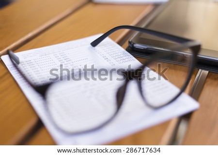 Glasses on bank account passbook